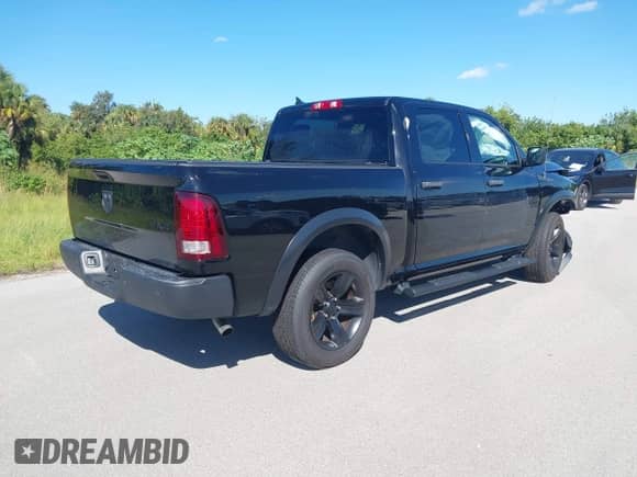 2022 Ram 1500 Warlock with VIN 1C6RR7LG4NS176356, listed as a IAAI auction lot 43423807 with 66,707 mi miles and . Bid and sale history available at DreamBid. Image 4.