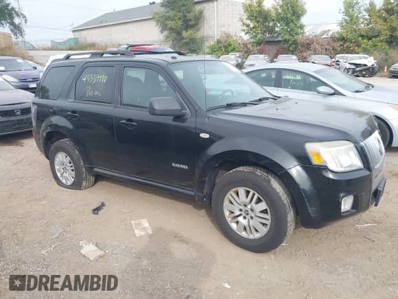 2008 Mercury Mariner with VIN 4M2CU91108KJ51427, listed as a IAAI auction lot 43339990 with 227,044 mi miles and . Bid and sale history available at DreamBid. Image 1.