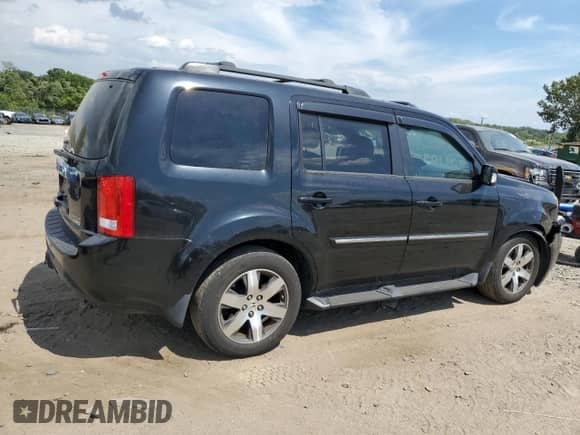 2012 Honda Pilot Touring with VIN 5FNYF4H96CB019699, listed as a Copart auction lot 70732935 with 267,196 mi miles and Salvage title. Bid and sale history available at DreamBid. Image 3.