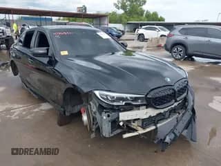 2020 BMW 3 Series 330i with VIN 3MW5R1J01L8B23880, listed as a IAAI auction lot 42865811 with Not provided miles and . Bid and sale history available at DreamBid. Image 1.