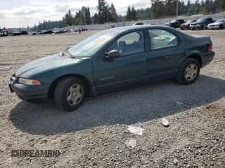 1998 Dodge Stratus with VIN 1B3EJ46X0WN303386, listed as a Copart auction lot 80188805 with 126,228 mi miles and Salvage title. Bid and sale history available at DreamBid. Image 1.