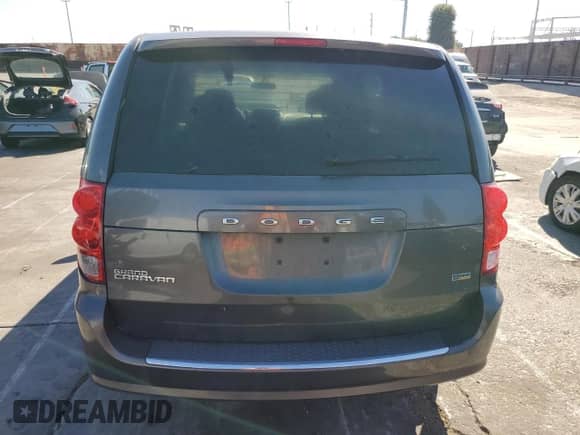 2016 Dodge Grand Caravan American Value z VIN 2C4RDGBG9GR262730, wystawiony jako Copart lot #90404065 z przebiegiem 181 105 mil mil oraz Czysty tytuł • Clean title. Historia ofert i sprzedaży dostępna na DreamBid. Obrazek 6.