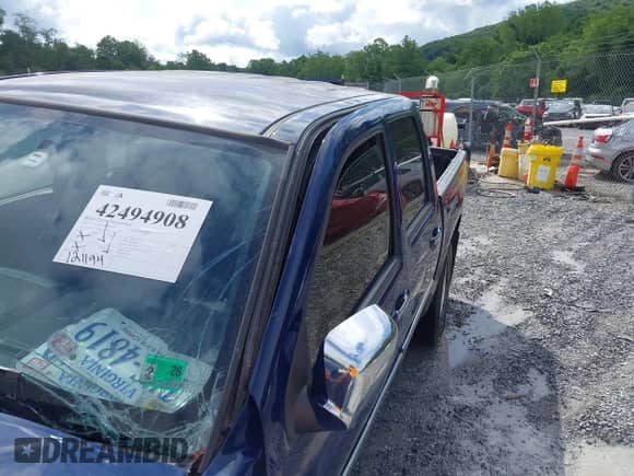 2011 Chevrolet Colorado 1LT z VIN 1GCHTCFE5B8124302, wystawiony jako IAAI lot #42494908 z przebiegiem 121 194 mil mil oraz . Historia ofert i sprzedaży dostępna na DreamBid. Obrazek 19.