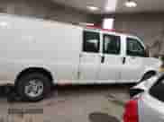2012 Chevrolet Express Cargo with VIN 1GCWGGBA0C1100411, listed as a IAAI auction lot 41024219 with 197,251 mi miles and . Bid and sale history available at DreamBid. Image 12.
