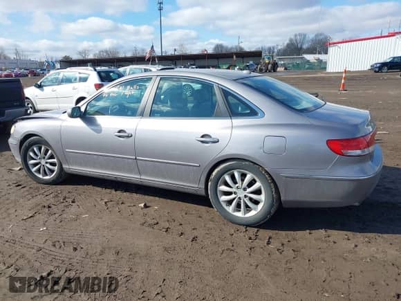 2008 Hyundai Azera Limited z VIN KMHFC46F18A303830, wystawiony jako IAAI lot #41488930 z przebiegiem 245 844 mil mil oraz . Historia ofert i sprzedaży dostępna na DreamBid. Obrazek 14.