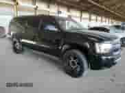 2014 Chevrolet Suburban LT with VIN 1GNSCJE0XER138413, listed as a Copart auction lot 84211905 with 168,362 mi miles and Salvage title. Bid and sale history available at DreamBid. Image 4.