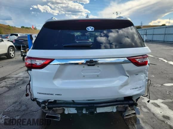 2019 Chevrolet Traverse Premier с VIN 1GNEVKKW0KJ303529, выставлен на аукционе Copart как лот 72046725 с пробегом 99 514 миль миль и Списание • Salvage title. История ставок и продаж доступна на DreamBid. Изображение 6.