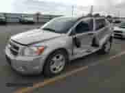 2008 Dodge Caliber SXT with VIN 1B3HB48B38D754624, listed as a Copart auction lot 84799085 with 137,663 mi miles and Salvage title. Bid and sale history available at DreamBid. Image 1.