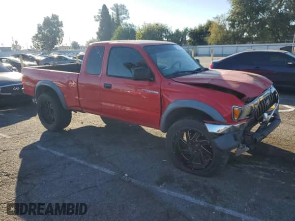 2001 Toyota Tacoma PreRunner with VIN 5TESN92NX1Z820983, listed as a Copart auction lot 87391055 with 213,806 mi miles and Salvage title. Bid and sale history available at DreamBid. Image 4.