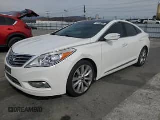 2014 Hyundai Azera Limited с VIN KMHFH4JG9EA345045, выставлен на аукционе Copart как лот 70586695 с пробегом 166 476 миль миль и Чистый • Clean title. История ставок и продаж доступна на DreamBid. Изображение 1.