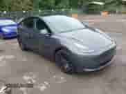 2023 Tesla Model Y Performance with VIN 7SAYGDEFXPF617908, listed as a IAAI auction lot 43233621 with 71,164 mi miles and . Bid and sale history available at DreamBid. Image 1.