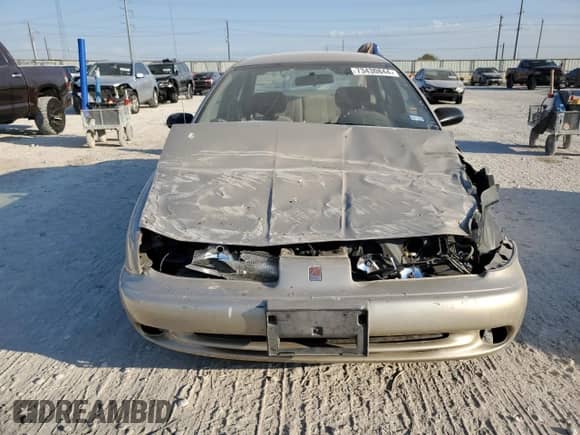 1998 Saturn SL с VIN 1G8ZK5270WZ273902, выставлен на аукционе Copart как лот 73430844 с пробегом Не указан миль и Списание • Salvage title. История ставок и продаж доступна на DreamBid. Изображение 5.