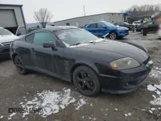 2006 Hyundai Tiburon GS с VIN KMHHM65D86U227276, выставлен на аукционе Copart как лот 44562695 с пробегом 187 017 миль миль и Списание • Salvage title. История ставок и продаж доступна на DreamBid. Изображение 4.