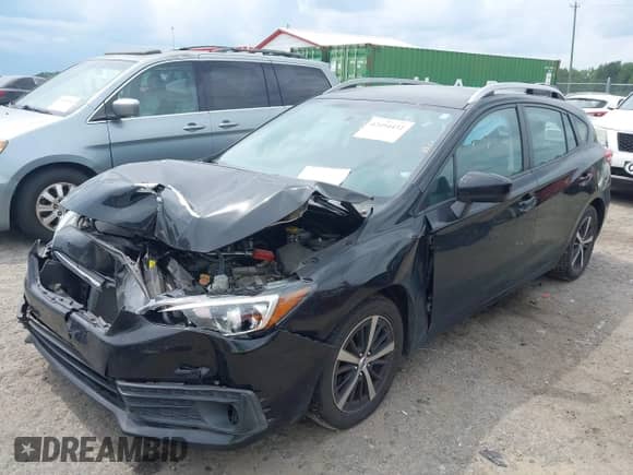 2020 Subaru Impreza Premium with VIN 4S3GTAV61L3732312, listed as a IAAI auction lot 42494432 with 118,419 mi miles and . Bid and sale history available at DreamBid. Image 2.