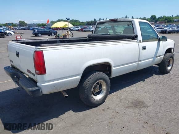 1997 GMC Sierra 1500 with VIN 1GTEK14W6VZ549578, listed as a IAAI auction lot 42415651 with 203,458 mi miles and . Bid and sale history available at DreamBid. Image 4.