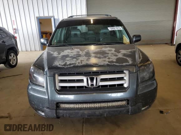 2006 Honda Pilot EX-L z VIN 5FNYF28716B012215, wystawiony jako Copart lot #59921815 z przebiegiem 217 664 mil mil oraz Szkoda całkowita • Salvage title. Historia ofert i sprzedaży dostępna na DreamBid. Obrazek 5.