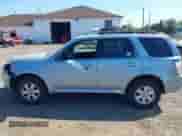 2008 Mercury Mariner with VIN 4M2CU91198KJ24730, listed as a IAAI auction lot 43341107 with 158,521 mi miles and . Bid and sale history available at DreamBid. Image 14.