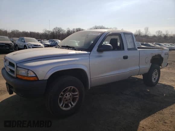 2003 Dodge Dakota с VIN 1D7HG12XX3S334064, выставлен на аукционе Copart как лот 48554465 с пробегом 140 660 миль миль и На запчасти • Non repairable. История ставок и продаж доступна на DreamBid. Изображение 1.