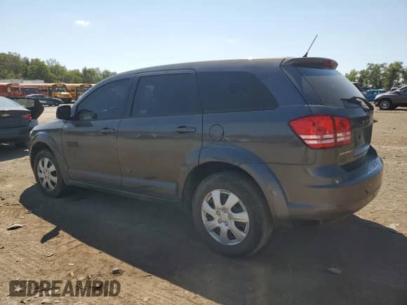 2014 Dodge Journey American Value with VIN 3C4PDCAB7ET198963, listed as a Copart auction lot 71792365 with 155,258 mi miles and Clean title. Bid and sale history available at DreamBid. Image 2.