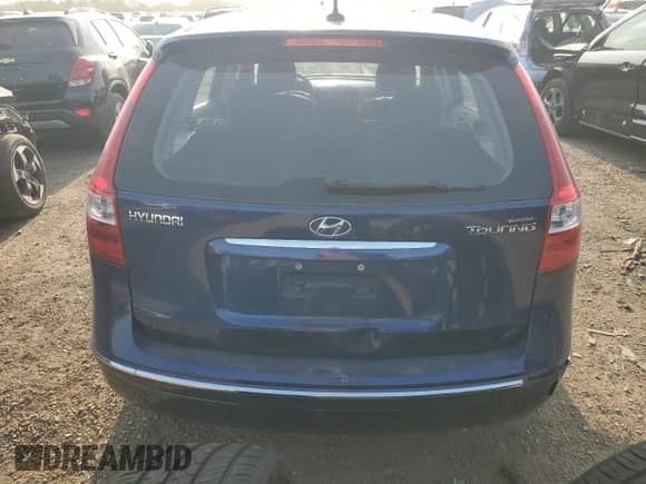2011 Hyundai Elantra GLS with VIN KMHDB8AEXBU100988, listed as a Copart auction lot 70205005 with 149,951 mi miles and Salvage title. Bid and sale history available at DreamBid. Image 6.