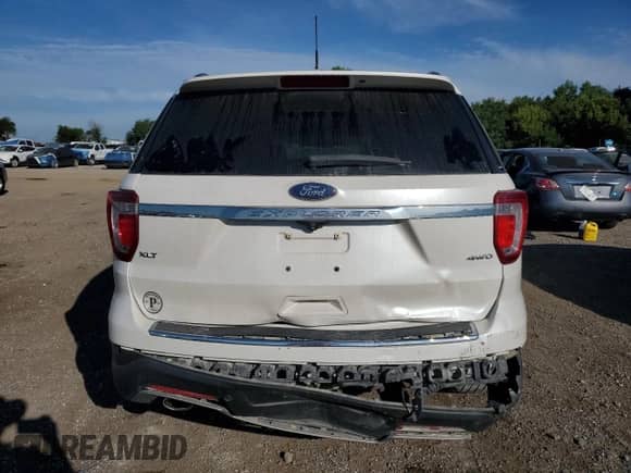 2018 Ford Explorer XLT с VIN 1FM5K8D8XJGB69736, выставлен на аукционе Copart как лот 69401535 с пробегом 135 609 миль миль и Списание • Salvage title. История ставок и продаж доступна на DreamBid. Изображение 6.