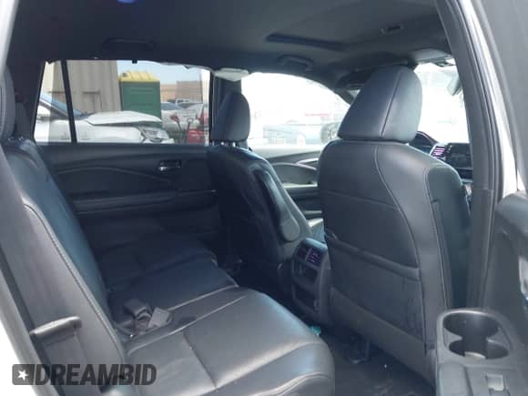 2021 Honda Passport EX-L with VIN 5FNYF7H59MB001083, listed as a IAAI auction lot 42943781 with 56,549 mi miles and . Bid and sale history available at DreamBid. Image 8.