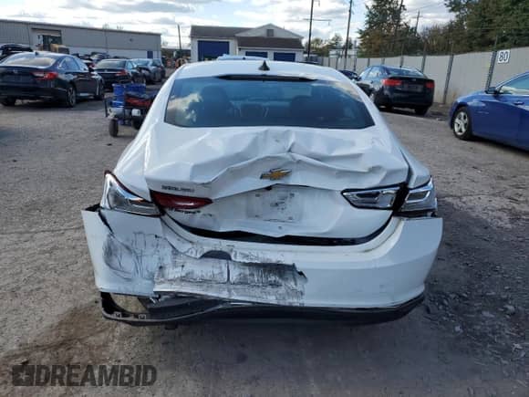 2020 Chevrolet Malibu LS с VIN 1G1ZB5ST6LF015215, выставлен на аукционе Copart как лот 89718385 с пробегом 76 519 миль миль и Списание • Salvage title. История ставок и продаж доступна на DreamBid. Изображение 6.