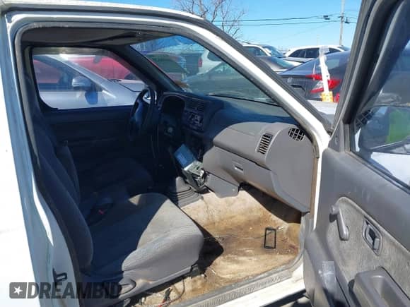 1999 Nissan Frontier XE with VIN 1N6DD26S0XC325585, listed as a IAAI auction lot 41698620 with 209,973 mi miles and . Bid and sale history available at DreamBid. Image 5.