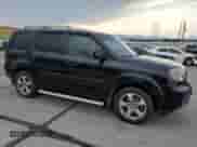 2015 Honda Pilot EX-L with VIN 5FNYF4H75FB067312, listed as a Copart auction lot 65169995 with 179,265 mi miles and Salvage title. Bid and sale history available at DreamBid. Image 4.