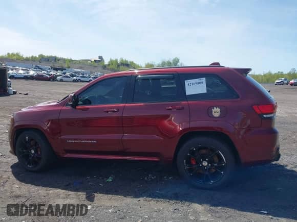 2016 Jeep Grand Cherokee SRT z VIN 1C4RJFDJ0GC366138, wystawiony jako IAAI lot #42169808 z przebiegiem 103 270 mil mil oraz . Historia ofert i sprzedaży dostępna na DreamBid. Obrazek 14.