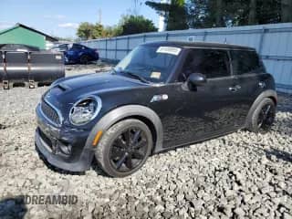 2013 MINI Hardtop S with VIN WMWSV3C50DT479105, listed as a Copart auction lot 81459895 with 94,002 mi miles and Salvage title. Bid and sale history available at DreamBid. Image 1.