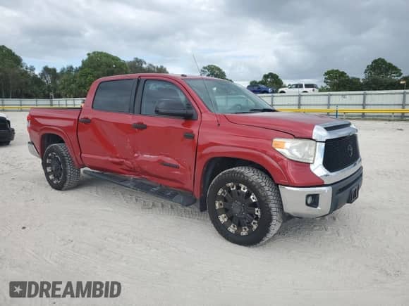 2016 Toyota Tundra SR5 с VIN 5TFDW5F14GX507580, выставлен на аукционе Copart как лот 82510725 с пробегом 128 931 миль миль и Списание • Salvage title. История ставок и продаж доступна на DreamBid. Изображение 4.