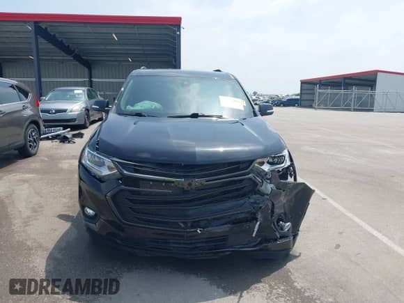 2021 Chevrolet Traverse Premier with VIN 1GNEVKKW6MJ245896, listed as a IAAI auction lot 42573984 with 56,484 mi miles and . Bid and sale history available at DreamBid. Image 12.