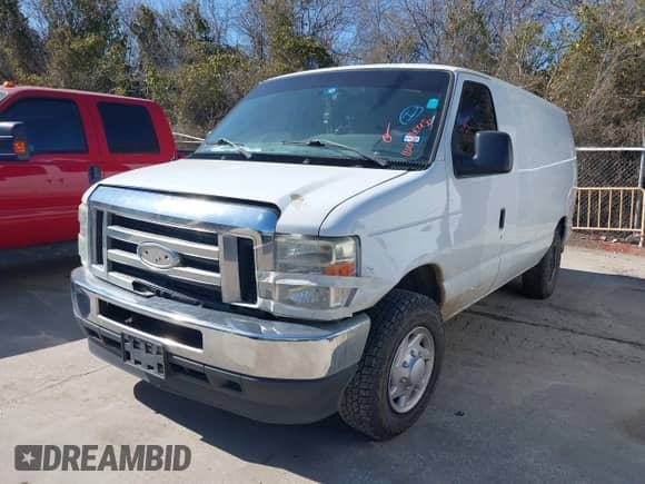 2013 Ford Econoline Cargo Commercial with VIN 1FTNE2EL0DDA69257, listed as a IAAI auction lot 41703772 with 261,935 mi miles and . Bid and sale history available at DreamBid. Image 2.