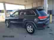 2014 Jeep Grand Cherokee Laredo z VIN 1C4RJFAG8EC280243, wystawiony jako Copart lot #68953675 z przebiegiem 121 886 mil mil oraz Szkoda całkowita • Salvage title. Historia ofert i sprzedaży dostępna na DreamBid. Obrazek 2.