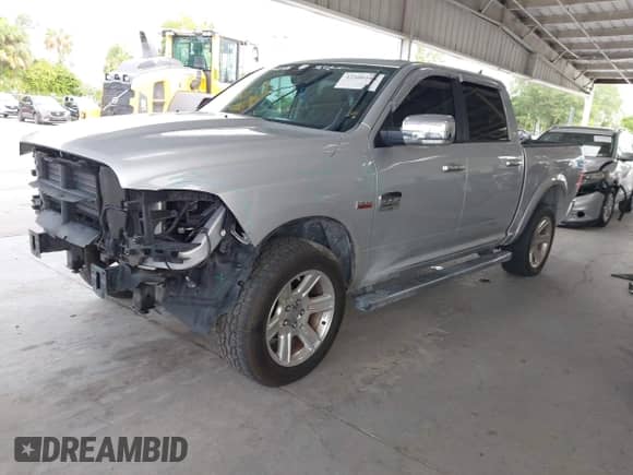 2015 Ram 1500 Laramie Limited with VIN 1C6RR7PT1FS788507, listed as a IAAI auction lot 42400146 with 129,572 mi miles and . Bid and sale history available at DreamBid. Image 18.
