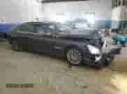 2014 BMW 7 Series 740Li with VIN WBAYE4C55ED137855, listed as a Copart auction lot 66704025 with 112,827 mi miles and Salvage title. Bid and sale history available at DreamBid. Image 4.