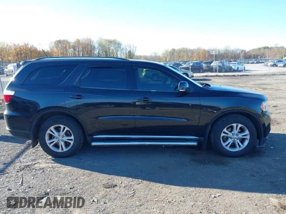2011 Dodge Durango Crew z VIN 1D4RE4GG5BC599694, wystawiony jako IAAI lot #43531802 z przebiegiem 146 445 mil mil oraz . Historia ofert i sprzedaży dostępna na DreamBid. Obrazek 13.