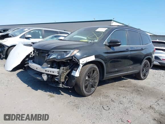 2022 Honda Pilot Special Edition with VIN 5FNYF5H24NB011709, listed as a IAAI auction lot 42604120 with 57,676 mi miles and . Bid and sale history available at DreamBid. Image 2.