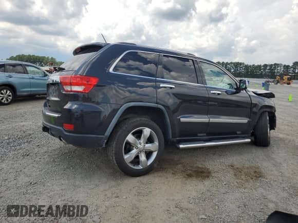 2011 Jeep Grand Cherokee Overland with VIN 1J4RR6GT3BC635757, listed as a Copart auction lot 66867405 with 106,307 mi miles and Salvage title. Bid and sale history available at DreamBid. Image 3.