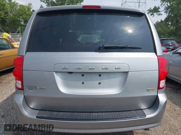 2018 Dodge Grand Caravan SE with VIN 2C4RDGBG1JR215392, listed as a IAAI auction lot 42412965 with 142,446 mi miles and . Bid and sale history available at DreamBid. Image 16.