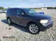 2013 Dodge Durango Crew with VIN 1C4SDJDT0DC660695, listed as a Copart auction lot 66135885 with 217,700 mi miles and Salvage title. Bid and sale history available at DreamBid. Image 4.