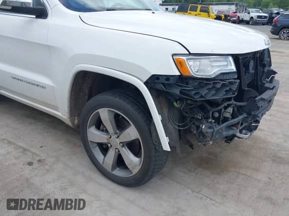 2015 Jeep Grand Cherokee High Altitude z VIN 1C4RJFCM5FC714493, wystawiony jako IAAI lot #42886915 z przebiegiem 180 687 mil mil oraz . Historia ofert i sprzedaży dostępna na DreamBid. Obrazek 17.