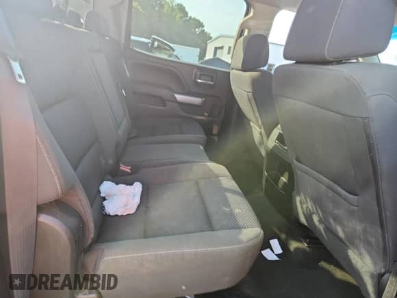 2017 Chevrolet Silverado 1500 LT z VIN 3GCUKREC6HG192230, wystawiony jako Copart lot #70720235 z przebiegiem Nie podano mil oraz Szkoda całkowita • Salvage title. Historia ofert i sprzedaży dostępna na DreamBid. Obrazek 10.