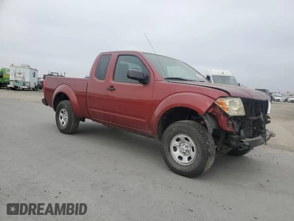 2014 Nissan Frontier S with VIN 1N6BD0CTXEN732839, listed as a Copart auction lot 66000045 with 130,711 mi miles and Salvage title. Bid and sale history available at DreamBid. Image 4.