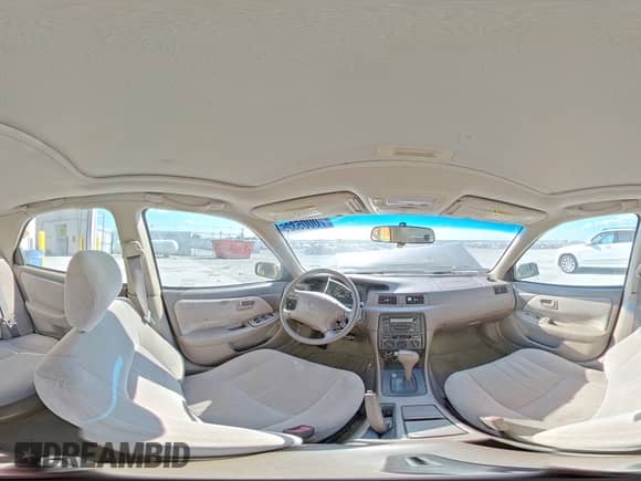 1999 Toyota Camry LE z VIN JT2BF28K2X0219943, wystawiony jako Copart lot #70005325 z przebiegiem Nie podano mil oraz Szkoda całkowita • Salvage title. Historia ofert i sprzedaży dostępna na DreamBid. Obrazek 14.