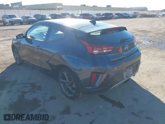 2020 Hyundai Veloster 2.0 with VIN KMHTG6AF5LU027945, listed as a IAAI auction lot 41004918 with 119,015 mi miles and . Bid and sale history available at DreamBid. Image 3.