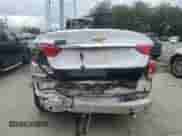 2014 Chevrolet Impala LT z VIN 2G1125S35E9103875, wystawiony jako Copart lot #63857705 z przebiegiem Nie podano mil oraz Szkoda całkowita • Salvage title. Historia ofert i sprzedaży dostępna na DreamBid. Obrazek 6.