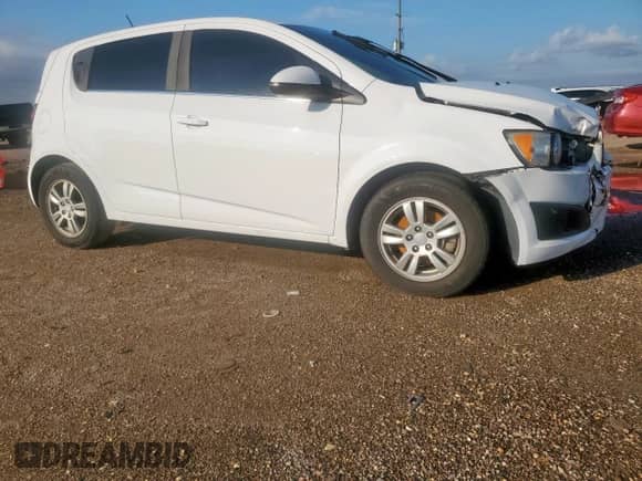2015 Chevrolet Sonic LT with VIN 1G1JC6SH5F4196643, listed as a Copart auction lot 71075155 with 82,089 mi miles and Salvage title. Bid and sale history available at DreamBid. Image 4.