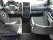 2010 Dodge Grand Caravan SE z VIN 2D4RN4DE8AR361850, wystawiony jako Copart lot #69758555 z przebiegiem 158 581 mil mil oraz Szkoda całkowita • Salvage title. Historia ofert i sprzedaży dostępna na DreamBid. Obrazek 8.